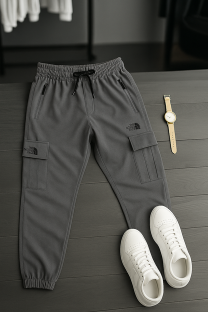 "Men’s Beige Cargo Trousers – Casual Streetwear with Zipper Pockets | The North Face Style"