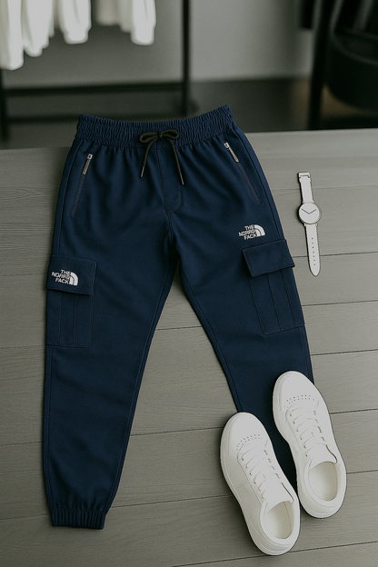 "Men’s Beige Cargo Trousers – Casual Streetwear with Zipper Pockets | The North Face Style"